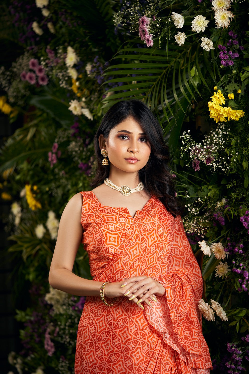 orange printed ruffle saree