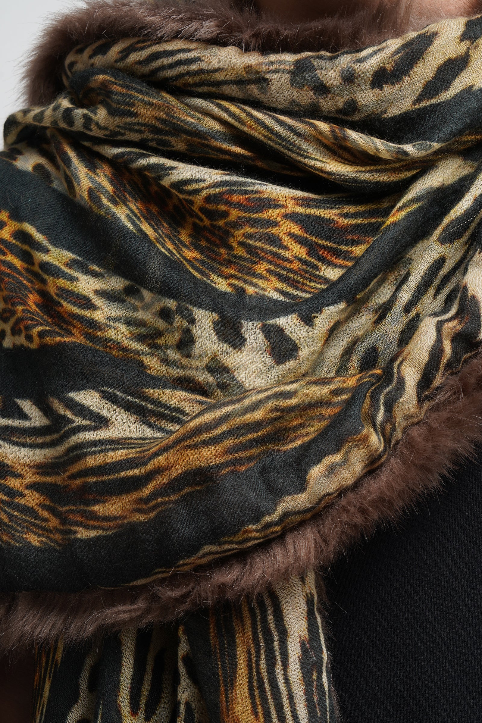 Fur stole and border with cashmere animal print