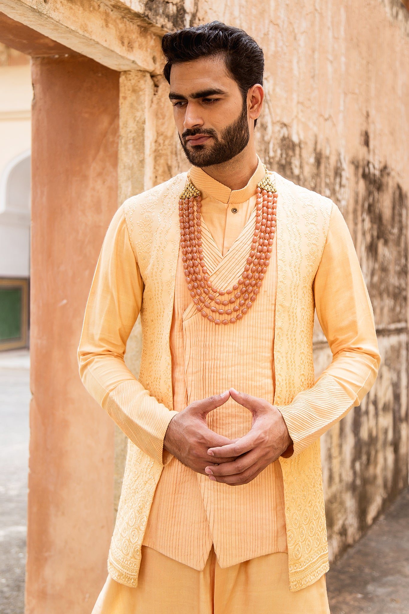 Saffron coloured kurta jacket set