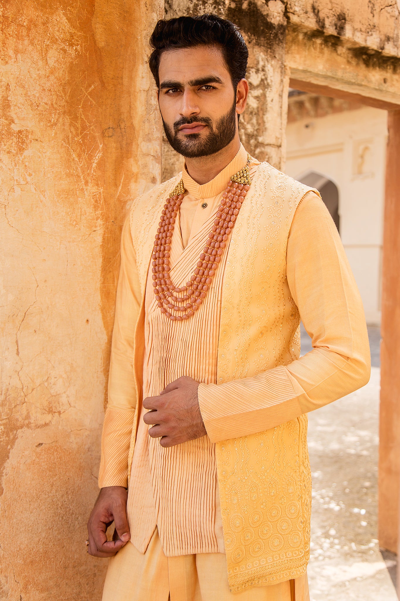 Saffron coloured kurta jacket set