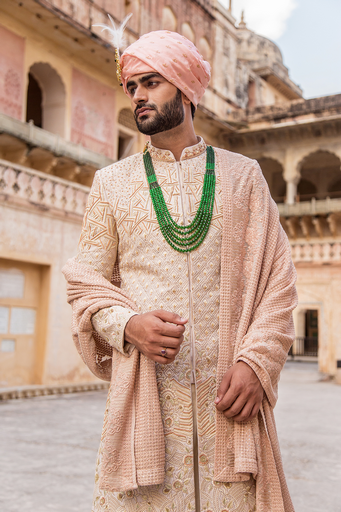 Ivory coloured embroidered sherwani