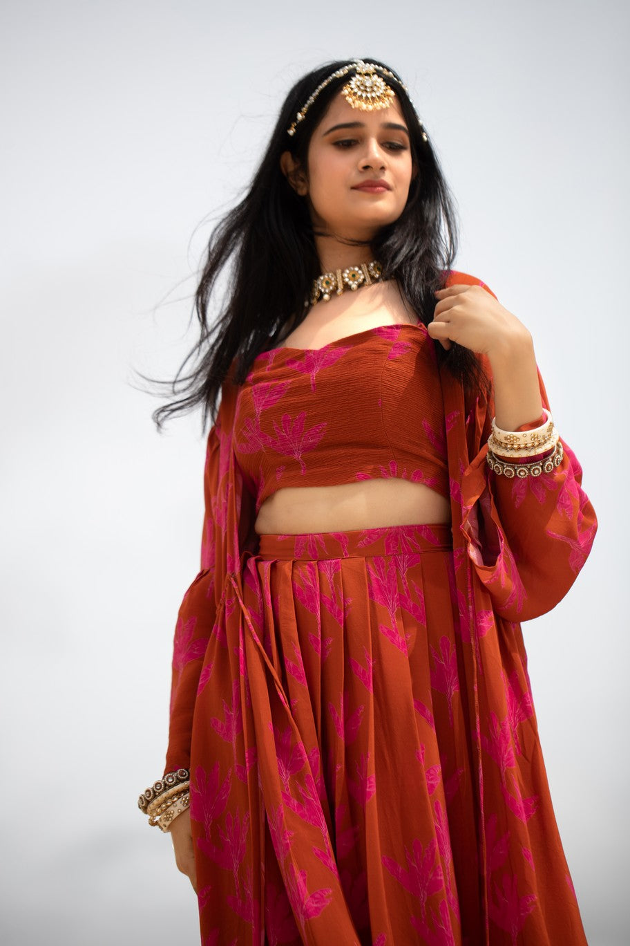 Pink banana lehenga with crop top and cape