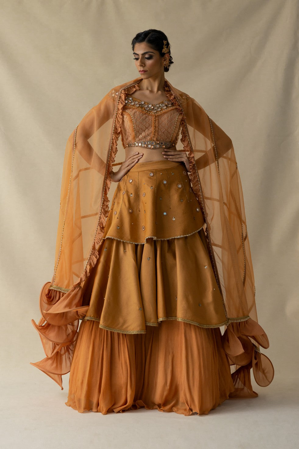 Rust layered lehenga set