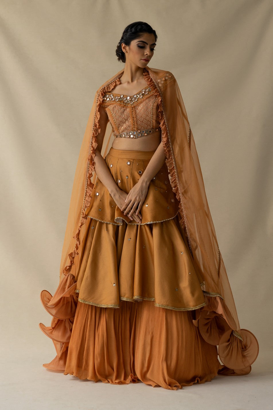 Rust layered lehenga set