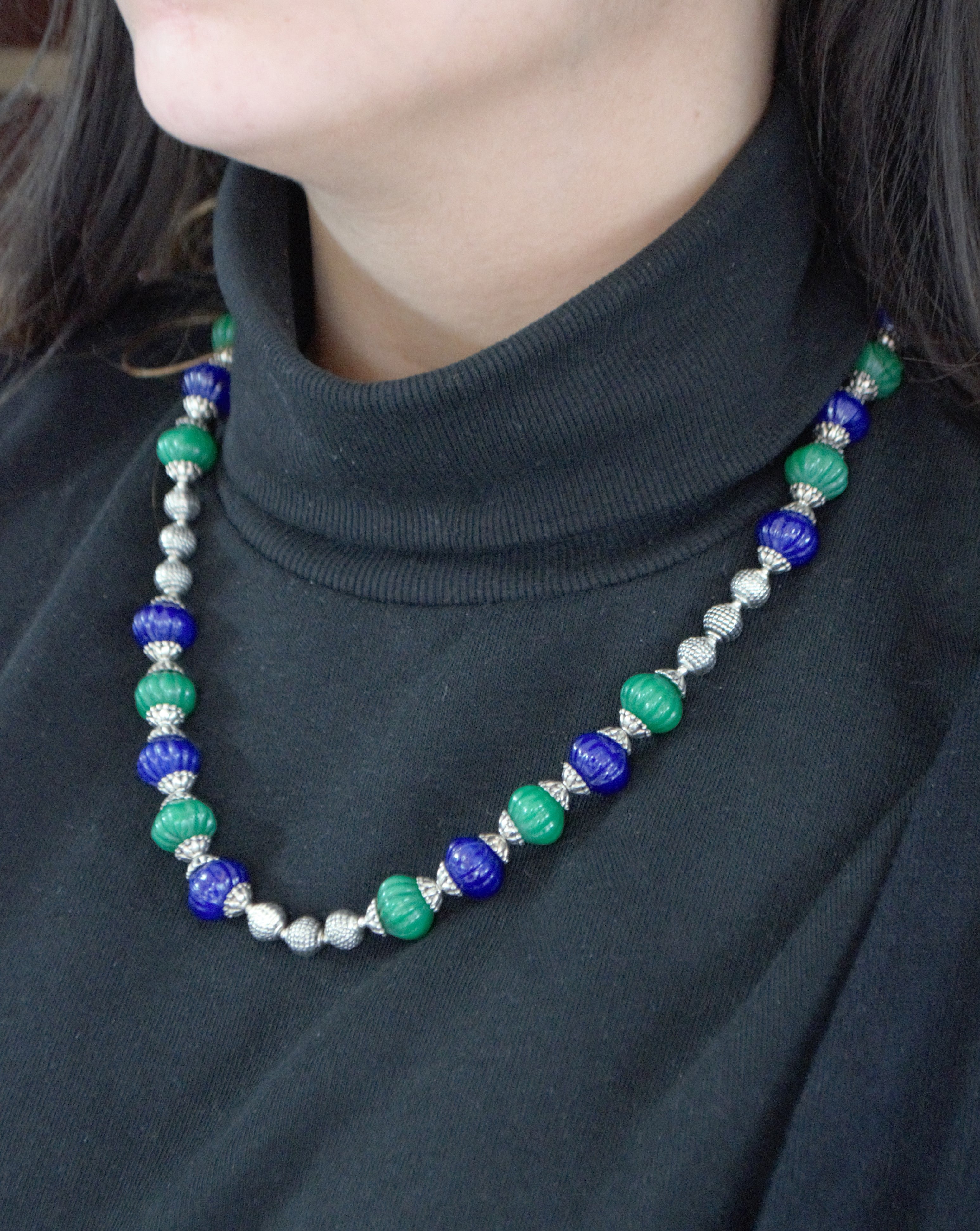 Silver capped blue green necklace