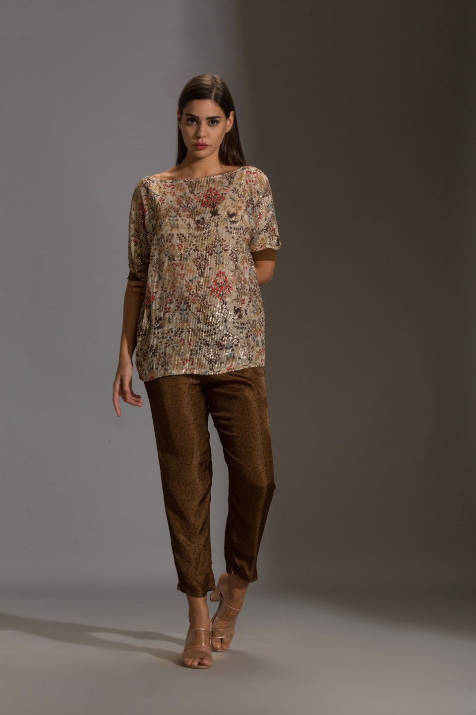 Prired one shoulder top paired with printed pants