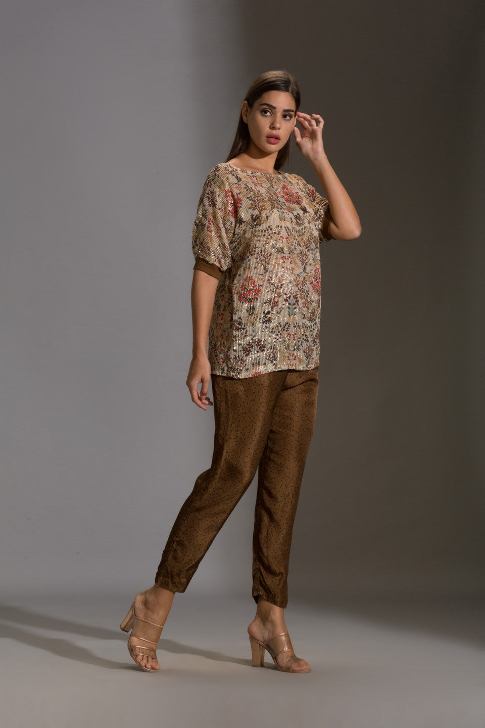 Prired one shoulder top paired with printed pants