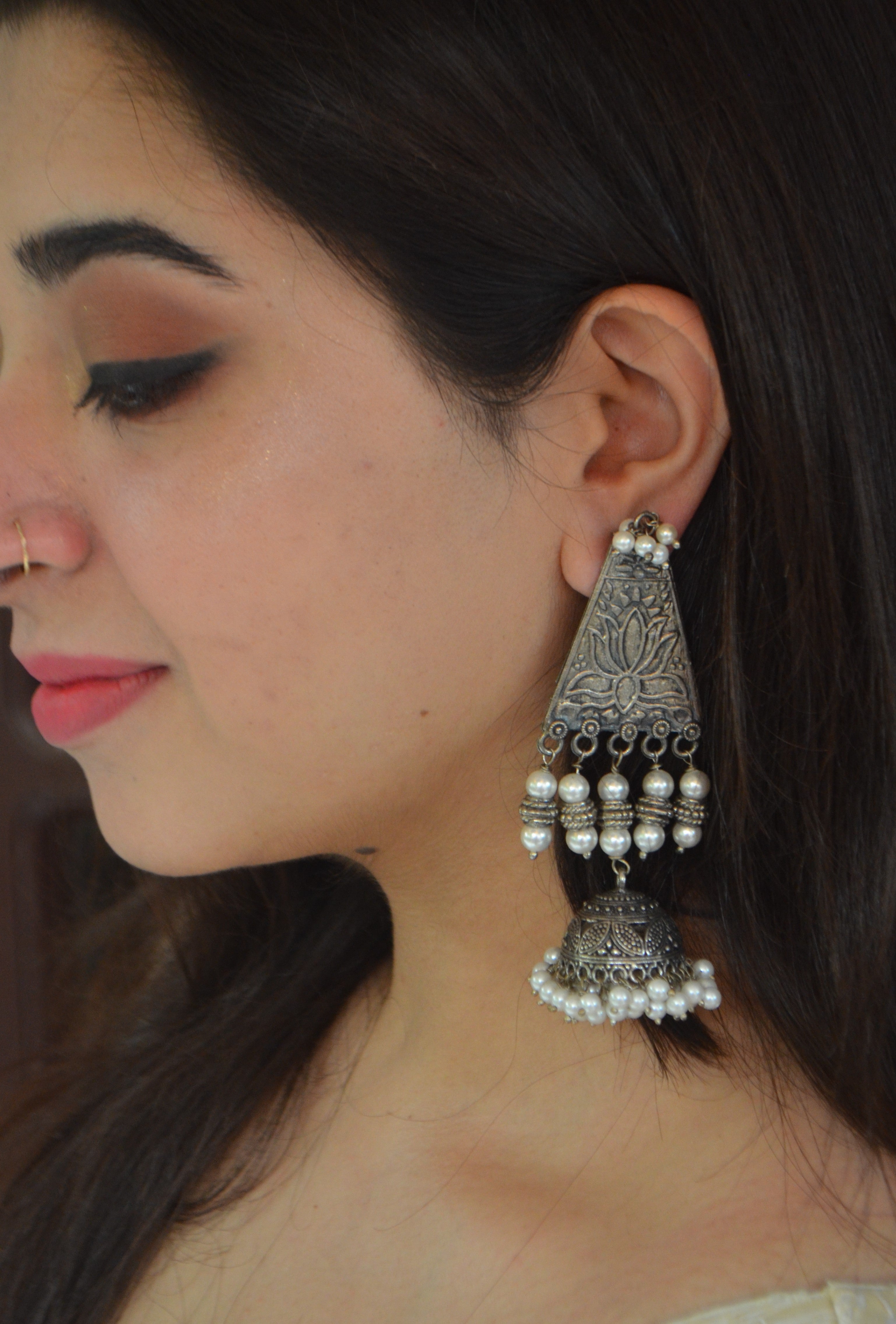 Tikoni pearl silver jhumkas