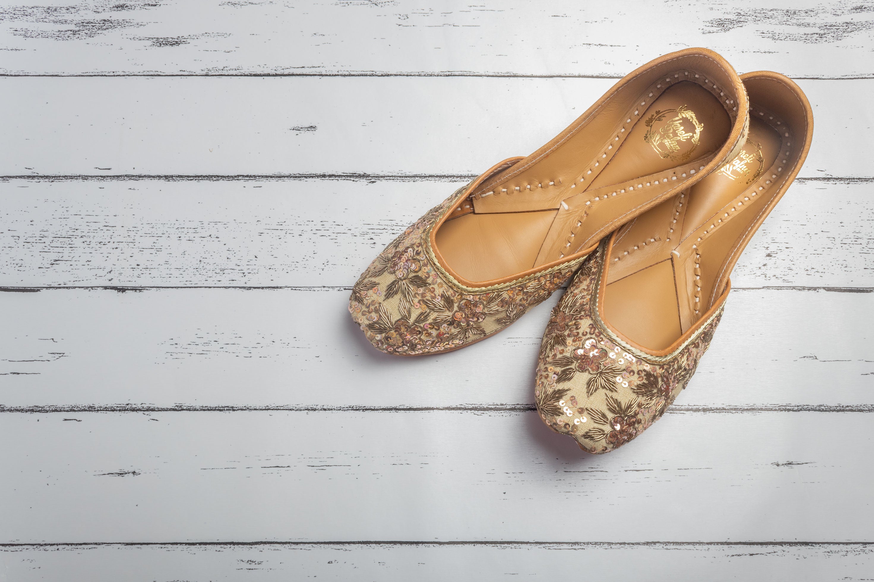 Beige Hand embroidered Juttis