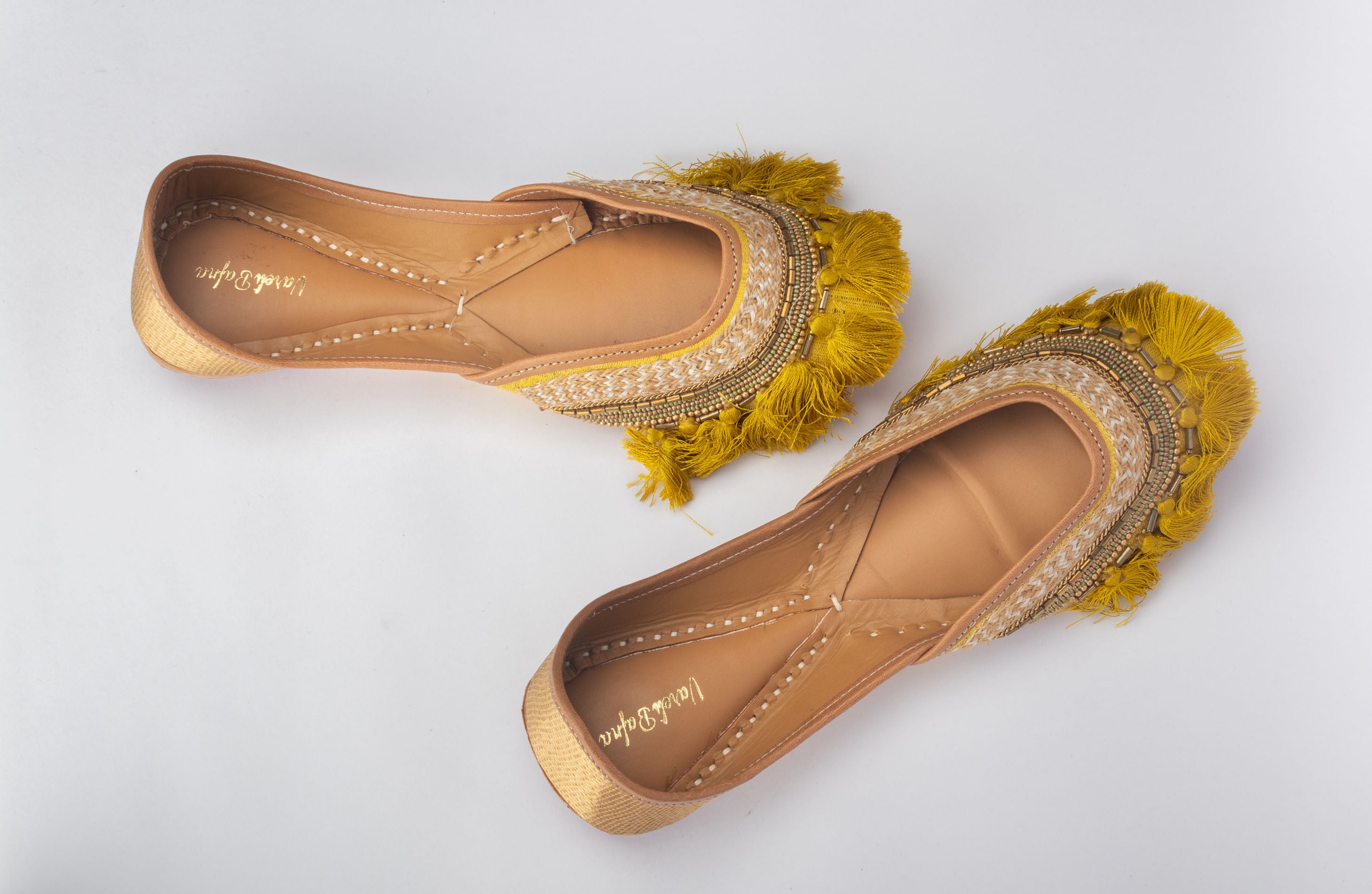 Yellow Hand embroidered Juttis