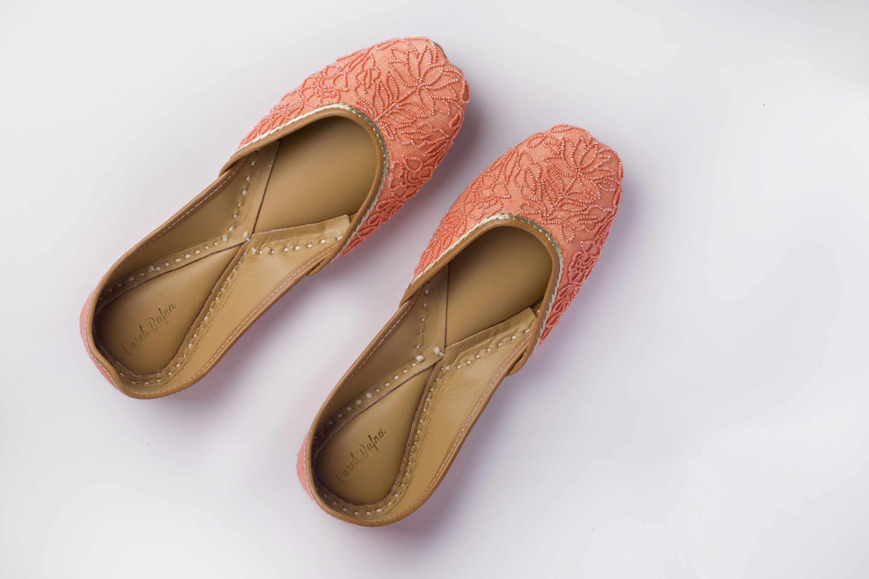 Bright Salmon Hand embroidered Juttis