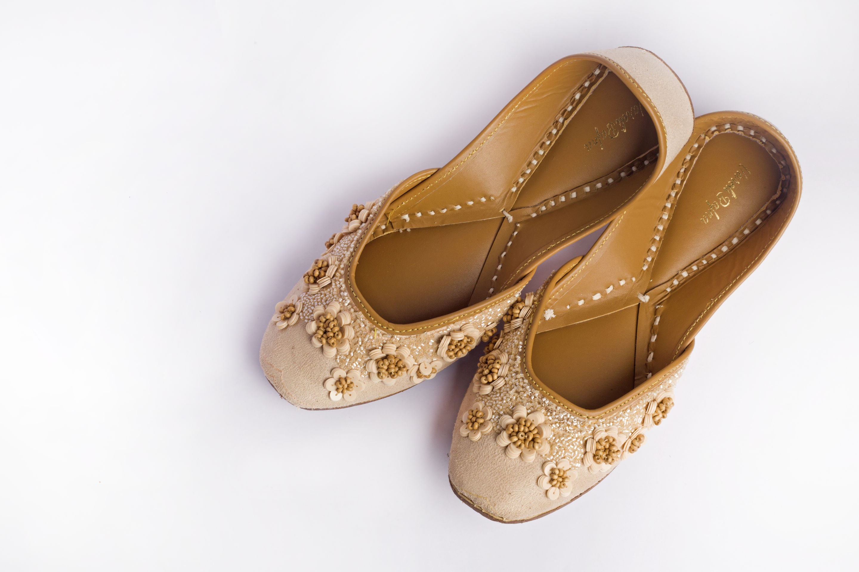 Beige Hand embroidered Juttis